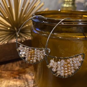 Gold beaded statement earring